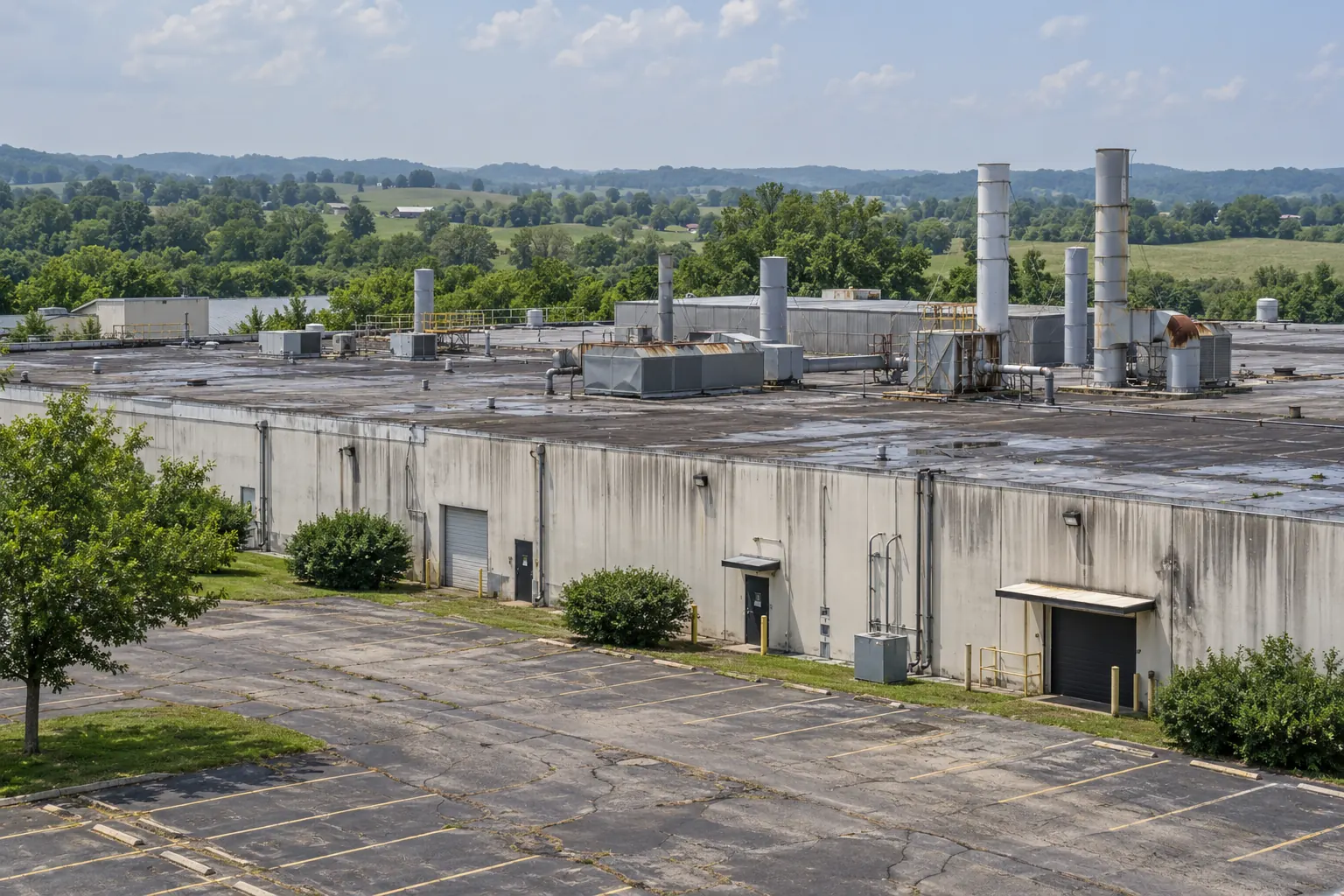 Plant roof crowded with stacks, vents, and ductwork